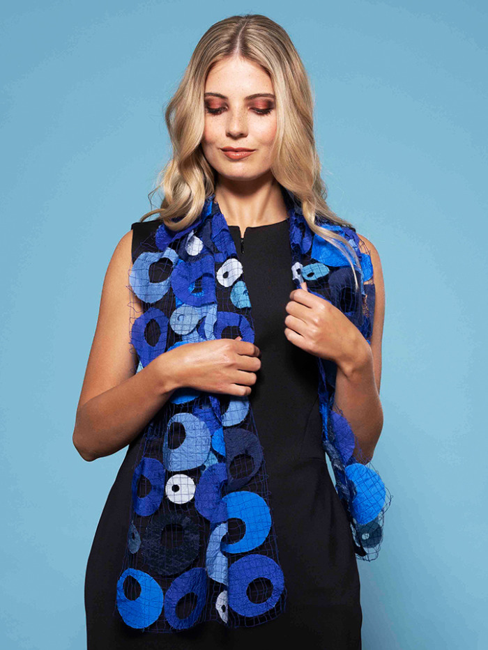 Playful scarf from blue fabric circles